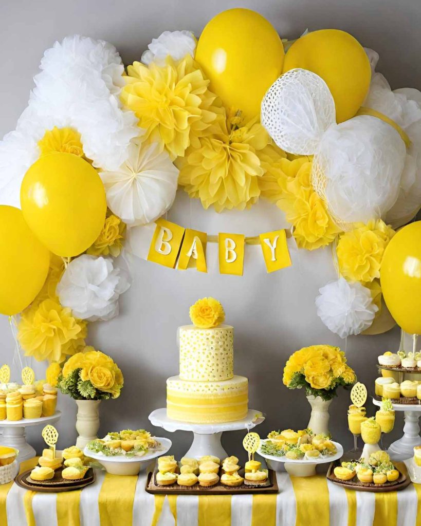 yellow baby shower decorations and cake